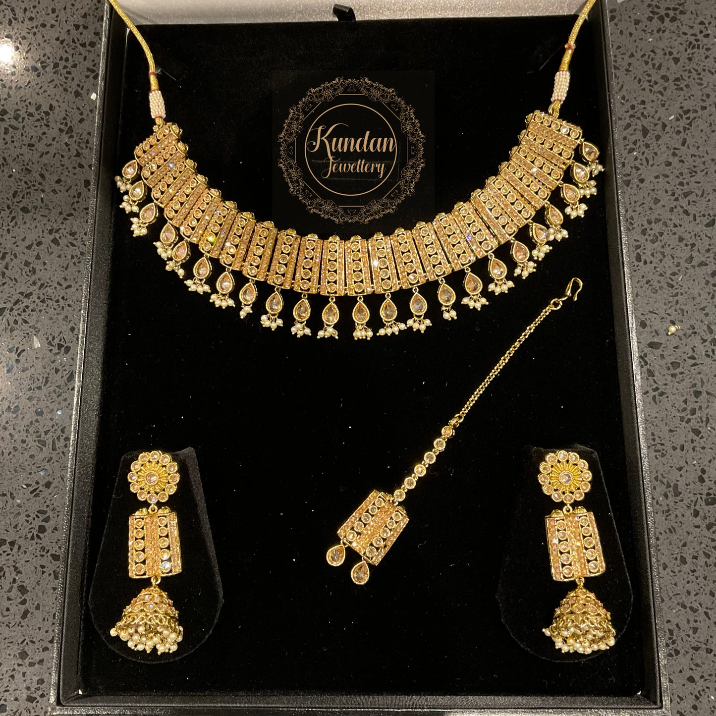 KOMAL - Gold